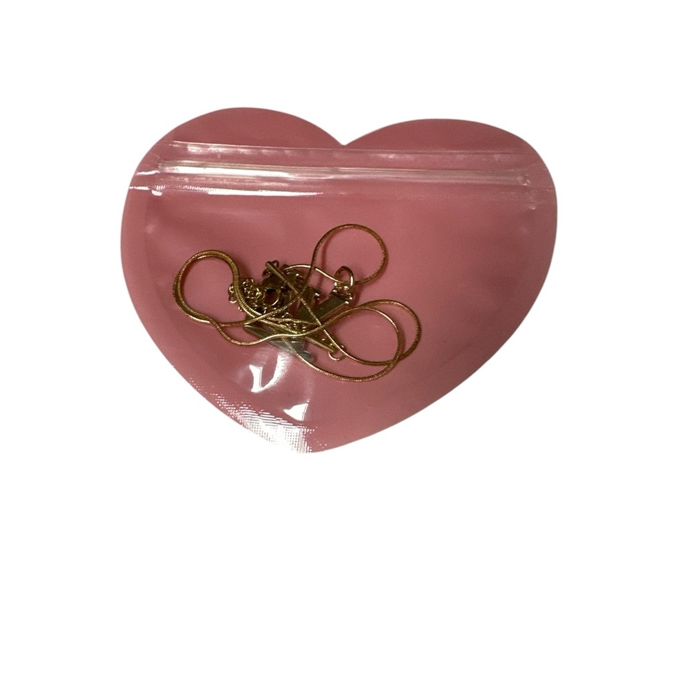 Gold Necklace with Interlocking Pendant
It is a great Valentines gift - Picture 3 of 3